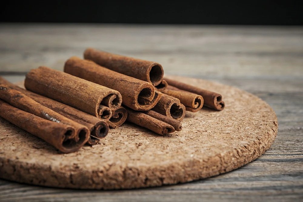 cinnamon sticks wooden table