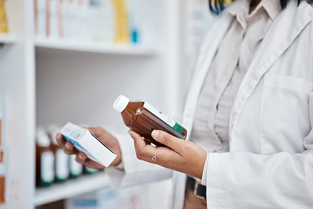 pharmacy stock hands drug information medicine pills ingredients checklist pharmacist work pharmaceutical products retail shop clinic with wellness employee reading label